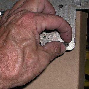 tightening bolts on separator plate
